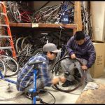 Fixing a flat at the Bikery