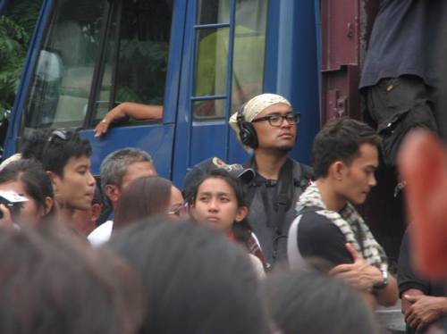 Contributor R.J. Lozada amidst a crowd of protestors at the SONA ng Bayan (People's SONA, or State of the Nation Address). Photo Courtesy of A. Beltran