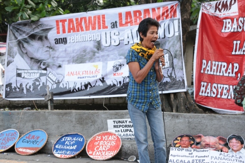 Flordia Sibayan, or "Pong," is the chair of AMBALA, the farmworkers union at Hacienda Luisita. She and about 50 farmers and organizers camped out in front of the offices Department of Agricultural Reform. They're protesting the lottery system, and other divide and conquer tactics to disrupt the movement for genuine agrarian reform. Photo courtesy of R. Lozada.
